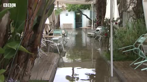 Severe flooding hits Spain's east coast after record rainfall - BBC News