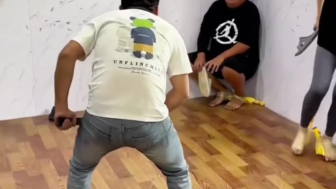 Screaming Chicken Blindfolded Beating Challenge, a mixed version for men and women