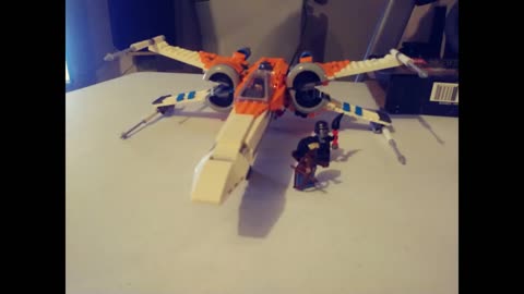 Star Wars X Wing Lego Kit Poe Dameron's ship along with R2D2, Knight of Ren, and Jannah