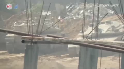 Al-Mujahideen Brigades striking a Zionist tank on the enemy’s axis of advance west of Jabalia, Gaza, Palestine, 23 Oct 2024