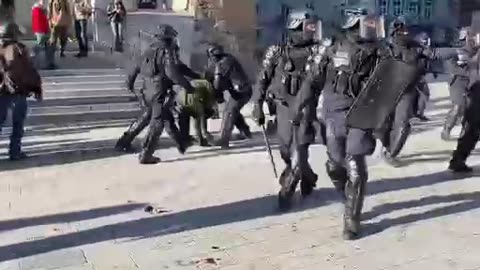 Vivid moment of beating protesters