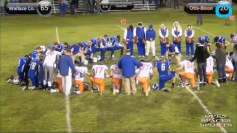 HIgh School Football Player Dies On Field After Scoring Touch Down