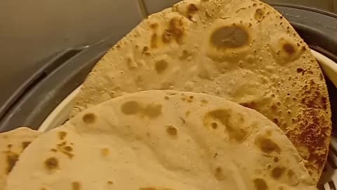 Making Roti..