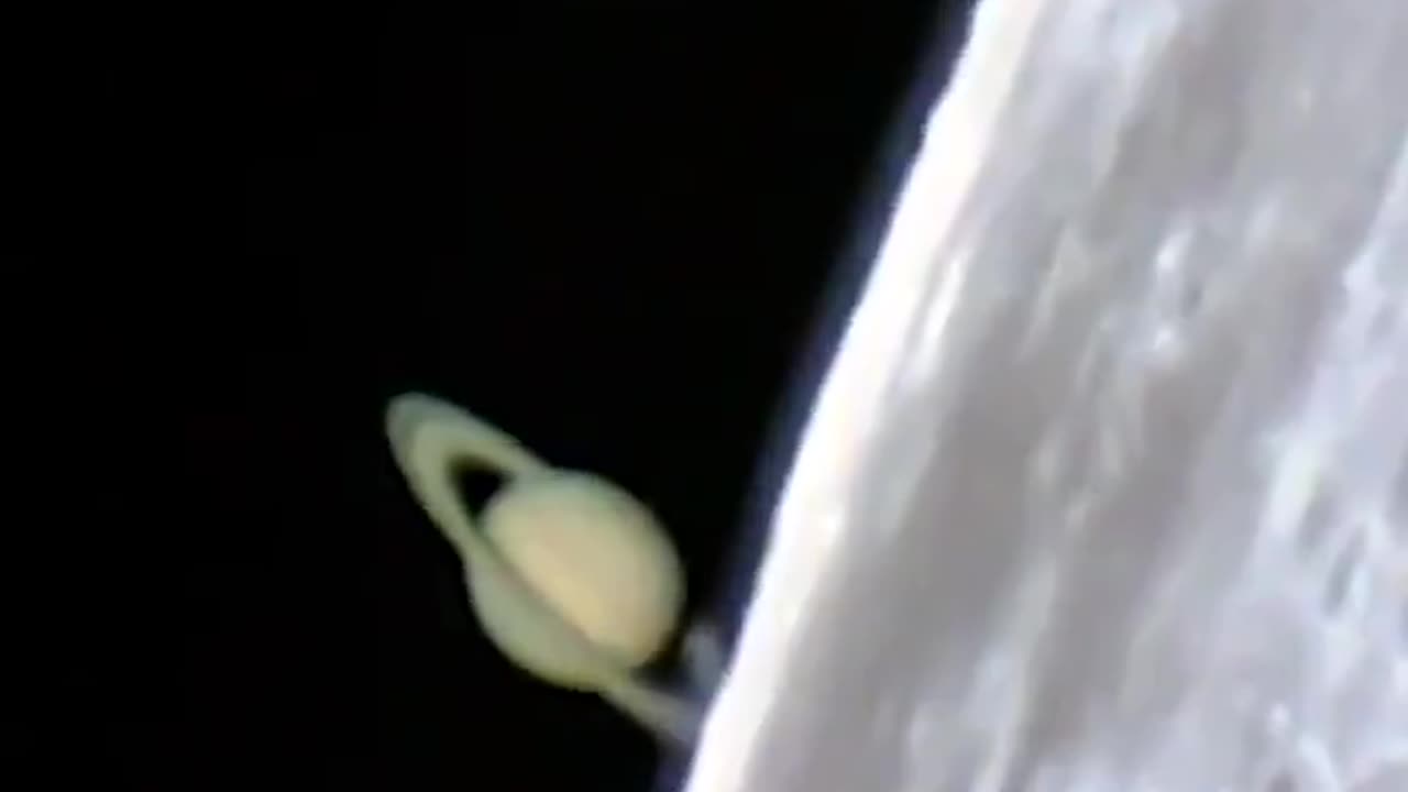 Incredible footage of Saturn rising from behind the Moon