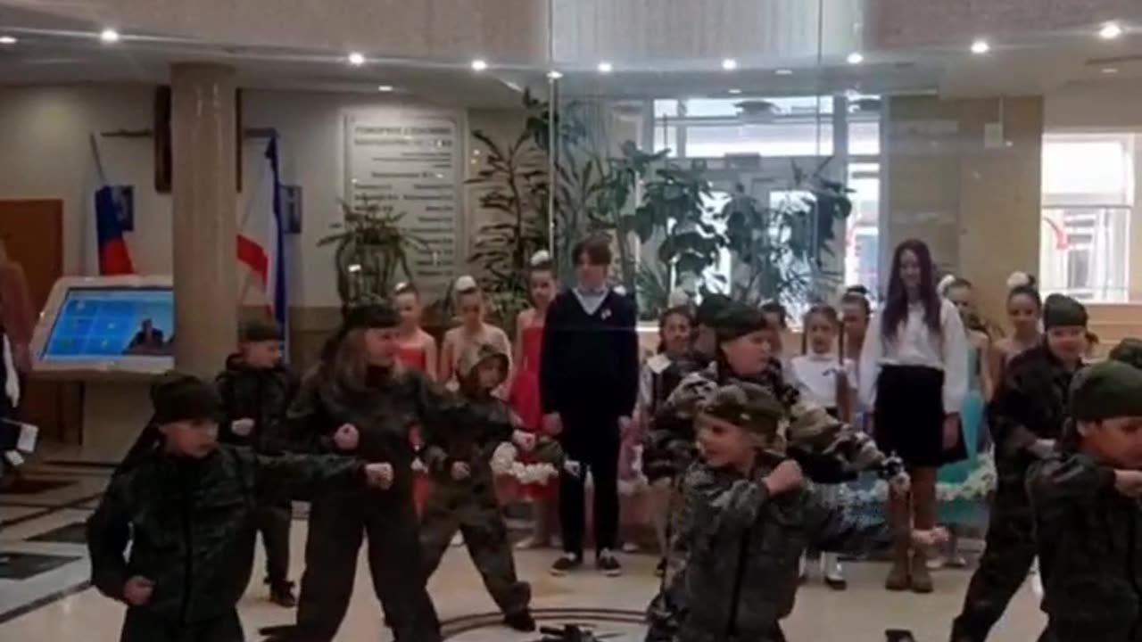 Instead of wondering what gender they are...all kids in Crimea learn defense skills...