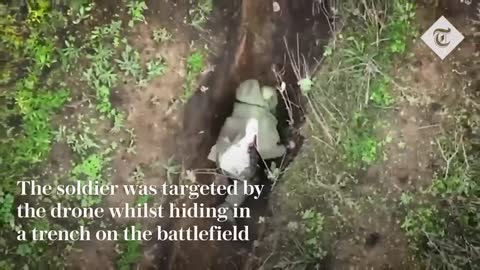 Moment Russian soldier catches and throws away Ukrainian 'drone bombs'