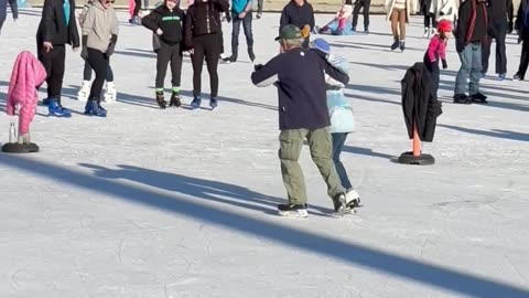 Adorable Elderly Couple Skate Together