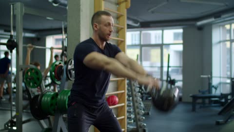 Man exercising with a kettlebell
