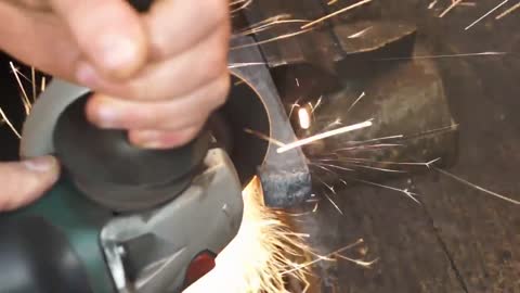 Damascus steel from two tape measures and 100 blades of stationery knives-12