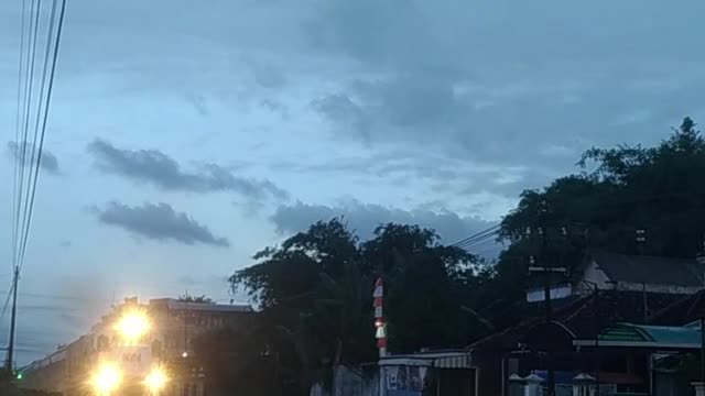 In the afternoon, Indonesian trains leave the station.