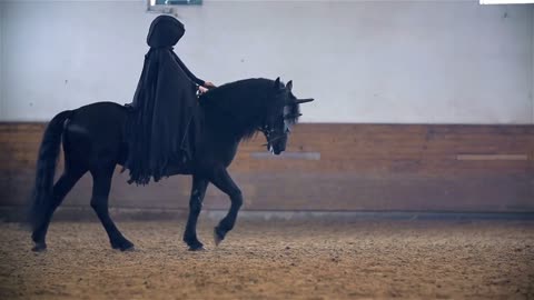 Someone Under Black Robe Riding Black Horse