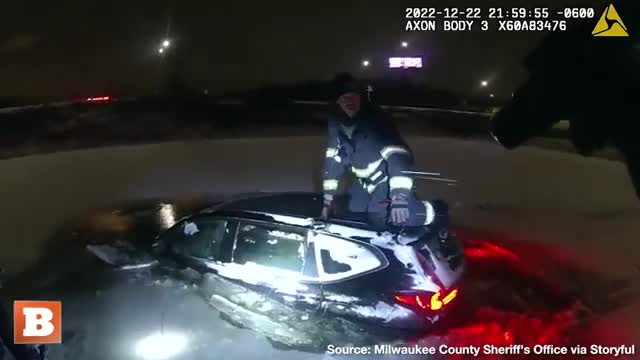 Rescue Team Saves Woman from Car Submerged in Frozen Pond