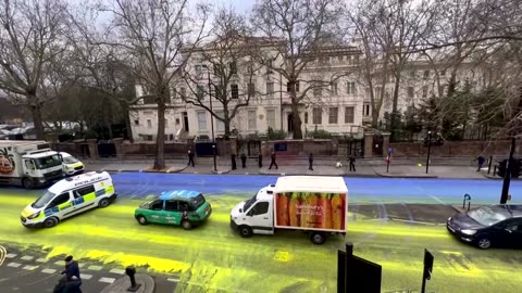 Huge Ukraine flag painted outside Russian embassy