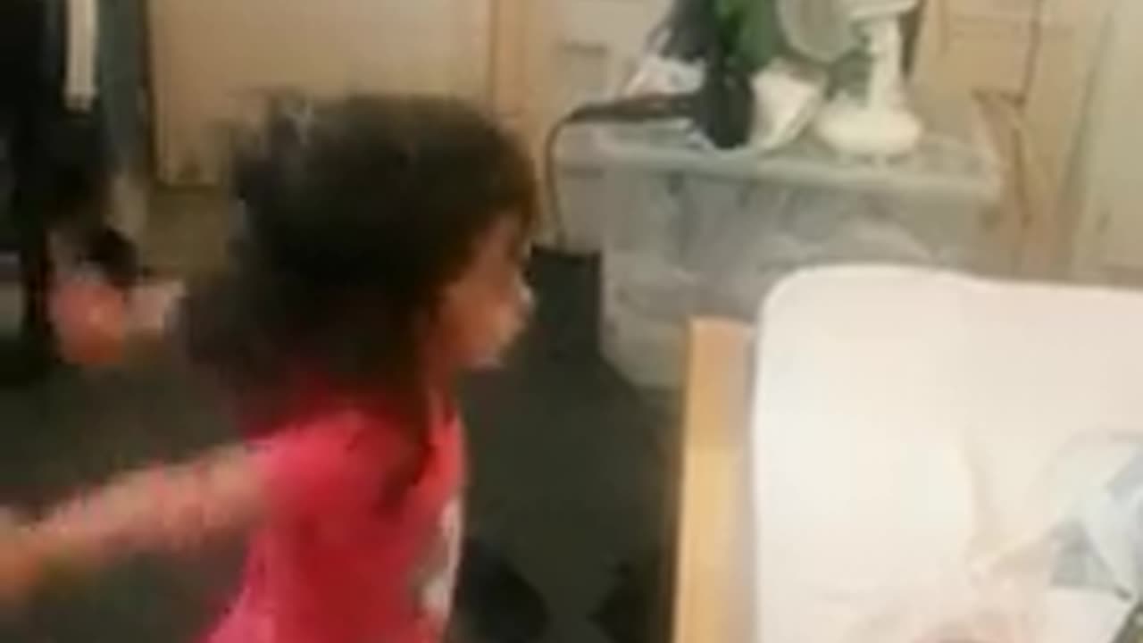 Little sweetheart dances and giggles making the room filled with joy