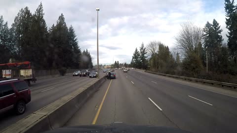Motorcyclist Wrecks into Car and Lands on Trunk