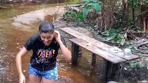 Girl Takes an Unexpected Dip and Laughs It Off