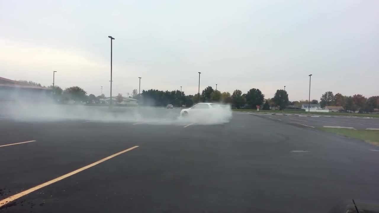 Idiot driver: A 2007 STI blows motor doing doughnuts