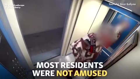 Russian prankster hangs a picture of Putin in the elevator and films the reactions of the residents