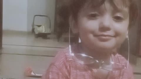 "Clearer Views: A Toddler's Journey with Glasses"