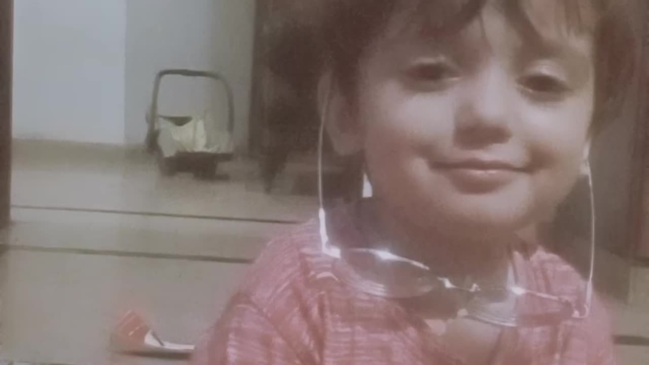 "Clearer Views: A Toddler's Journey with Glasses"