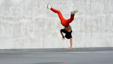 Man dance on his hand
