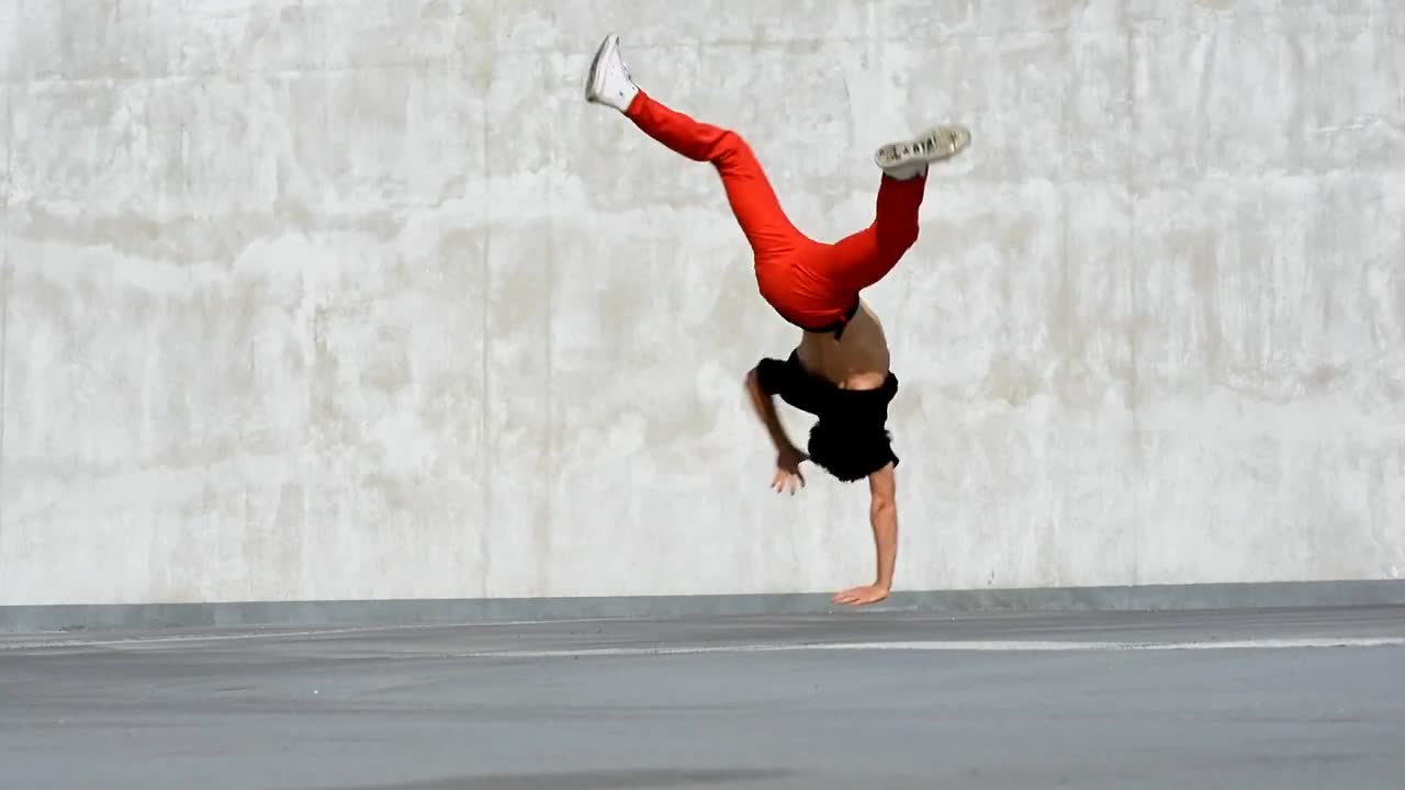 Man dance on his hand