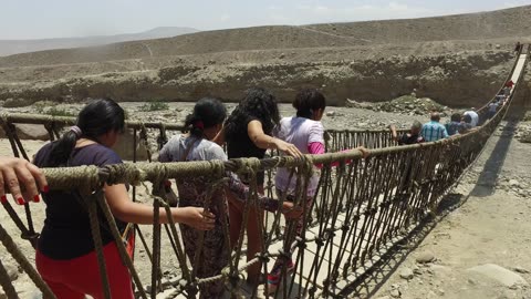 Crossing a Hanging Bridge