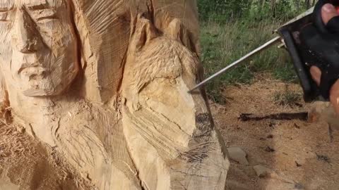 AMAZING CHAINSAW wood carving, Native American with wolves