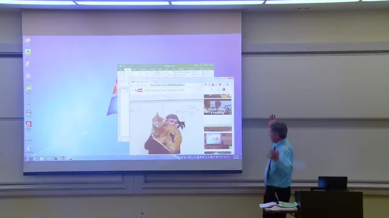 Maths Professor fixes projector screen