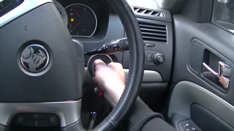 How to fix a car key button that won't lock and unlock the door.