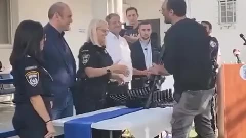 Israeli Minister Ben Gvir distributing assault rifles to illegal settlers in the West Bank