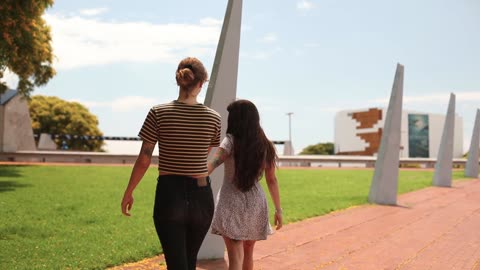 boyfriend and girlfriend holding hands