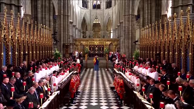 Moment of silence amid queen's funeral grandeur