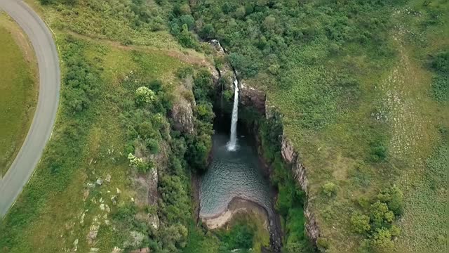 Waterfall Downpours To A River Vally Areal View Of Waterfall In HD