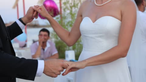 Married Couple Enjoy Dancing At Wedding