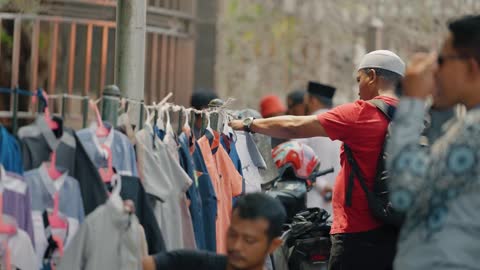 Long Shot of Men Shopping in Jakarta