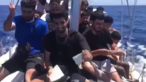 Invaders en route to Italy from the shores of Libya openly destroy their passports