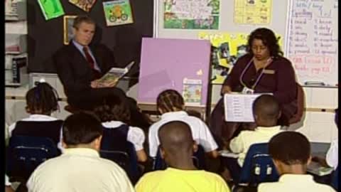 The moment Bush was alerted of the WTC terrorist attacks in NY