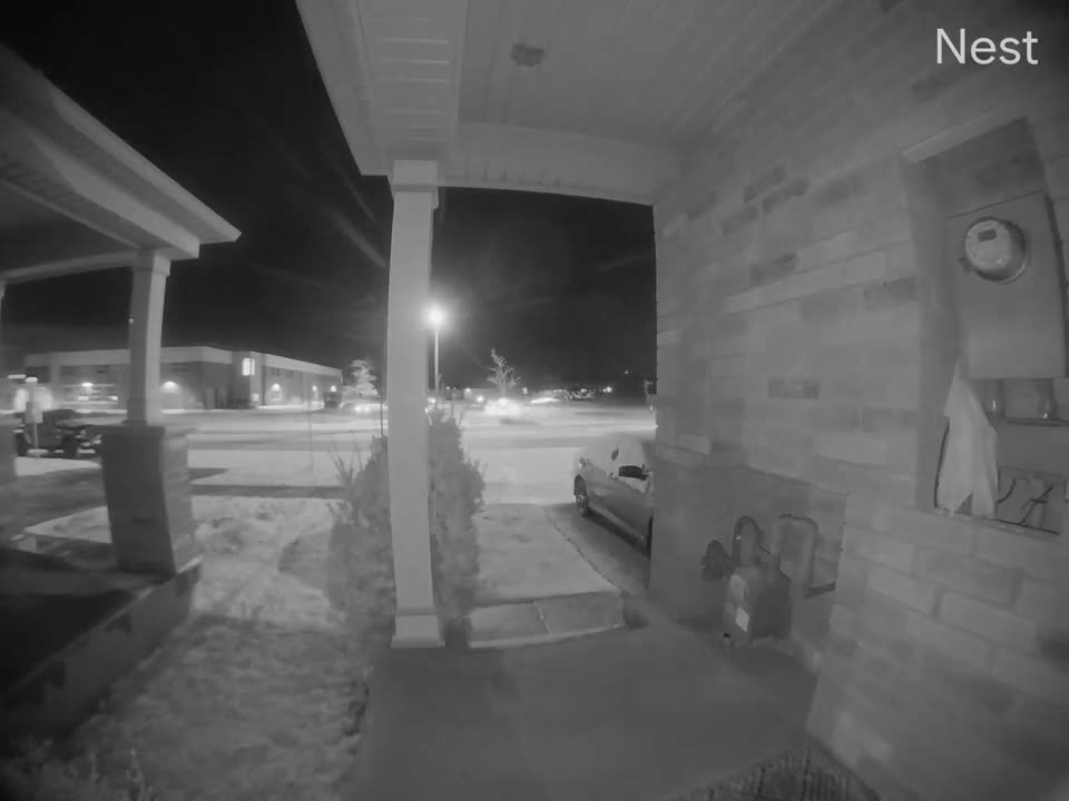 SUV Does a 360 Into the Light Pole After Losing Control on the Snow