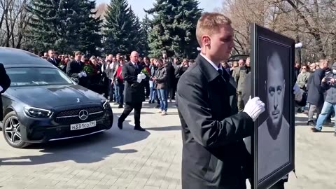 Funeral held for Russian pro-war blogger killed in blast
