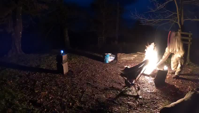 Chilling a campfire. Setting up the camera for a vlog