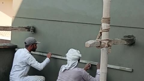 Gray plastic work with hand made groves