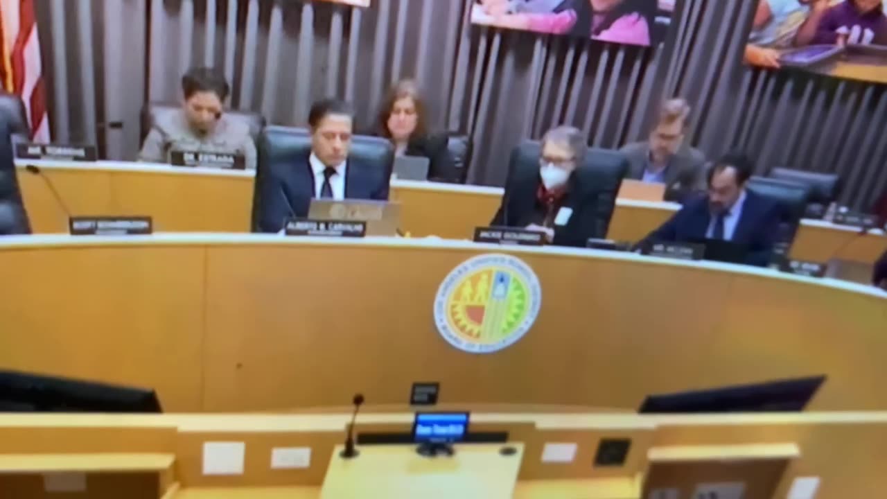 Monique Lukens speaks to a School Board
