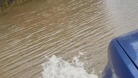 Ford Escape plows though 4ft water