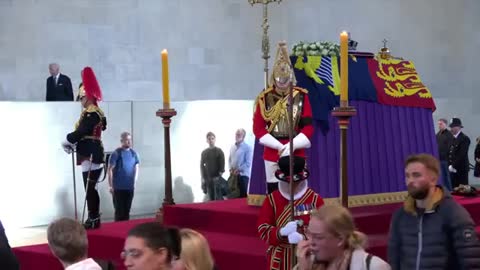 Emotional Joe Biden Views Queen Lying in State in London_4