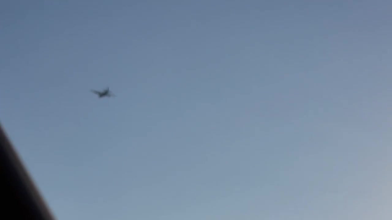 PLANE SUSPENDED IN MID AIR