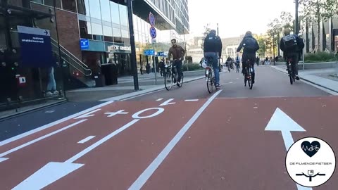 North America installs a single bike rack next to a train station* Meanwhile in the Netherlands: