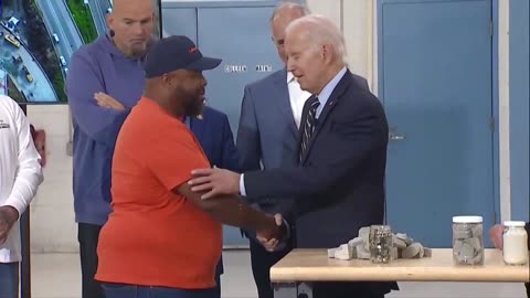 Biden's Greeting to a Union Member: "He's Got Guns As Big As My Thighs"