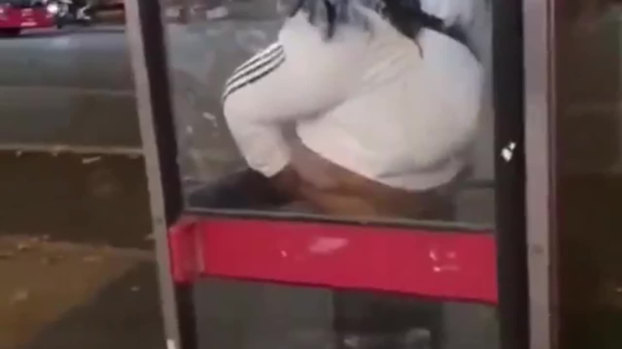 An African immigrant pooped in a phone booth in the UK.