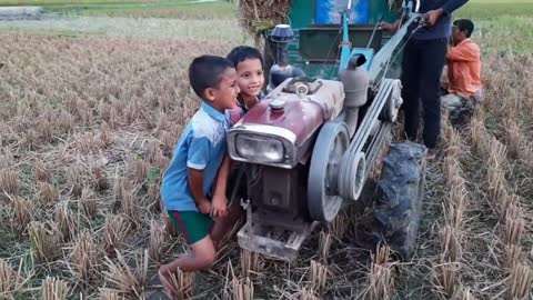 Small boy starting power tiller _ How to start power tiller _